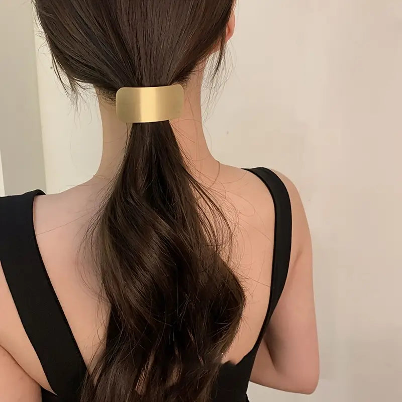 Goma para el pelo de metal dorado