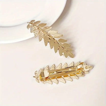 Pinza para el pelo con forma de hoja dorada